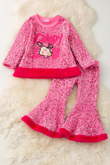  Christmas character application on pink sequins top and bell bottoms. OFG42792 AMY