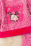 Christmas character application on pink sequins top and bell bottoms. OFG42792 AMY