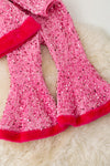 Christmas character application on pink sequins top and bell bottoms. OFG42792 AMY