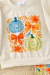 Bow & pumpkin printed on ivory & printed bottoms. OFG61137 SOL
