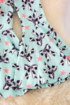 OFG41421 SOL: Cow Coquette printed bow with bell bottoms.