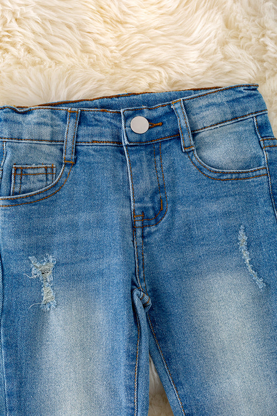 Girls denim pants with distressed hem. PNG40198 AMY