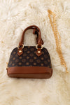 BROWN STAR PRINTED PURSE WITH PINK TRIM.  BBG50118