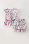 Floral printed w/fuchsia front button and ruffle shorts. OFG62612 AMY