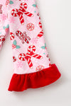 Candy cane printed on pink with ruffle hem. RPG61440 AMY