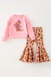 Merry Christmas Y'all" Pink top and cow printed bell bottoms. OFG61881 AMY