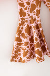 Merry Christmas Y'all" Pink top and cow printed bell bottoms. OFG61881 AMY