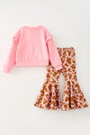 Merry Christmas Y'all" Pink top and cow printed bell bottoms. OFG61881 AMY