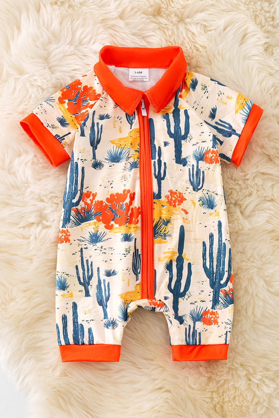 (Western) Dry dessert on cream printed baby romper with orange trim. RPB50321 Jean