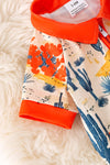 (Western) Dry dessert on cream printed baby romper with orange trim. RPB50321 Jean