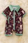 Bull skull & cactus printed on brown baby romper with green trim. RPB50494 JEAN
