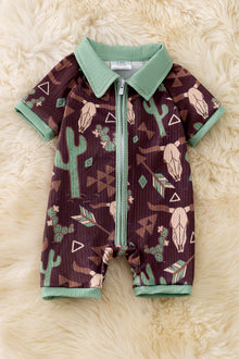  Bull skull & cactus printed on brown baby romper with green trim. RPB50494 JEAN