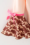 "Howdy Christmas" Cream top with cow printed bell sleeved and animal printed pants. OFG61882 MON