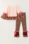 "Howdy Christmas" Cream top with cow printed bell sleeved and animal printed pants. OFG61882 MON