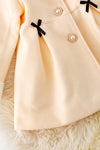 TPG40409 Sol: Ivory lined jacket with cozy fur trim.