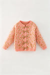 Coral animal print sweater w/front bows. TPG60522 AMY
