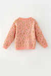 Coral animal print sweater w/front bows. TPG60522 AMY