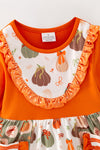 Orange tunic with printed pumpkins & stripe pockets & matching bell bottoms. OFG62383 JEAN