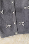 Gray button up cardigan with peal buttons. TPG52053 AMY