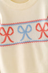 Cream bow knit sweater. TPG60610 MON