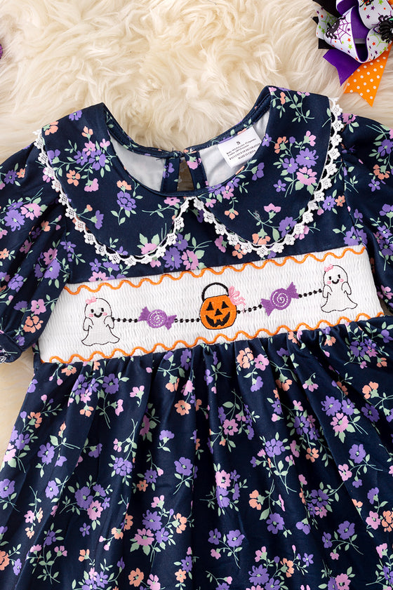 Navy blue floral smocked floral dress with bubble sleeves. DRG52121 SOL