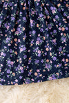 Navy blue floral smocked floral dress with bubble sleeves. DRG52121 SOL