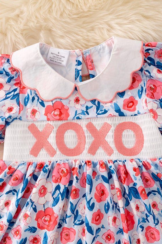 XO XO XO Floral smocked dress with side pockets. DRG50077AMY