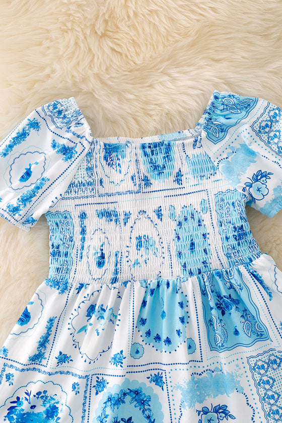 Blue accent/ multi printed patch dress with ruffle hem. DRG43466 J