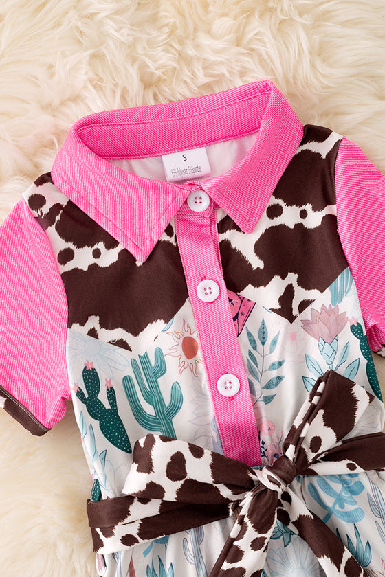Cow printed and fuchsia trim girls jumpsuit. PNG50410 SOL
