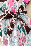 Cow printed and fuchsia trim girls jumpsuit. PNG50410 SOL