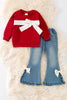 Red long sleeve sweatshirt with denim pants.  OFG50980 SOL