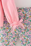 Pink long sleeve top with a bow on sleeves and floral pants. OFG62818 MON