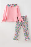Pink long sleeve top with a bow on sleeves and floral pants. OFG62818 MON