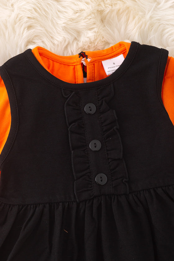 Black ghost applique dress with orange undershirt. OFG51174 AMY