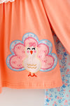 Coral Turkey applique tunic with blue floral bottoms. OFG61932 SOL