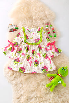  Gr*nch printed girls dress with sleeve bells. DRG52182 Jean