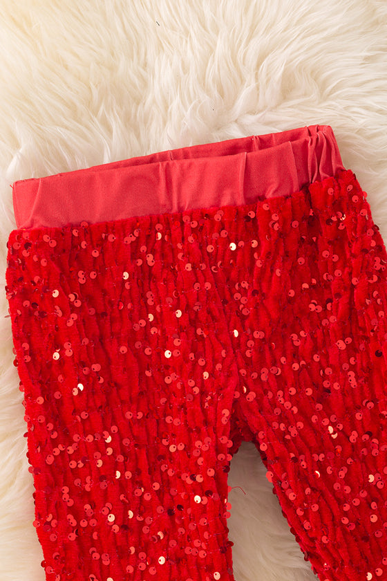 Red sequins bell bottoms with faux fur trim. PNG50267 SOL