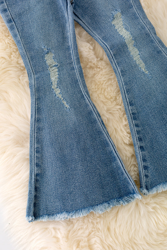 PNG40450 WEN: Denim blue distressed denim jeans.