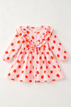 Pumpkin printed on pink gingham ruffle dress. DRG64473 SOL