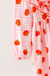 Pumpkin printed on pink gingham ruffle dress. DRG64473 SOL