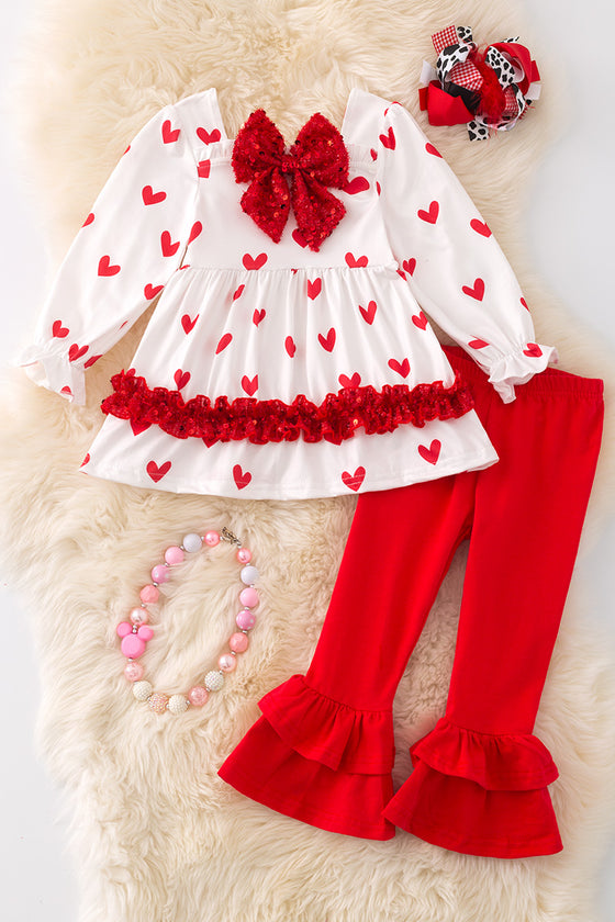 Heart printed on white tunic with red ruffle pants. OFG42791 JEAN