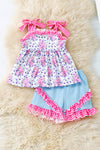 Purple/pink floral tunic with gingham straps and blue shorts. OFG53421 SOL