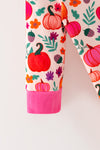 Multi color pumpkin printed baby romper with fuchsia contrast. RPG64312 Mon