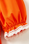 Orange smocked dress with embroidered pumpkin. DRG64521 AMY