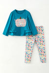 Teal tunic with pumpkin applique and floral leggings. OFG63393 SOL