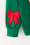 Merry Christmas green top and Red bow printed bottoms. OFG63378 AMY