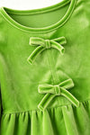 Green faux velvety tunic and red pants. OFG63380 MON