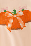 Cream top and bottoms, top has pumpkin applique. OFG62650 AMY
