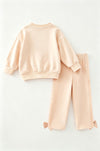 Cream top and bottoms, top has pumpkin applique. OFG62650 AMY