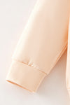 Cream top and bottoms, top has pumpkin applique. OFG62650 AMY